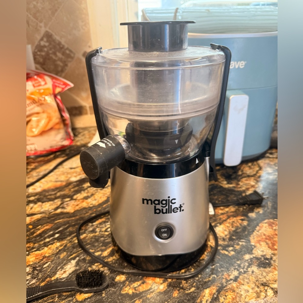 Silver and Black Magic Bullet Juicer